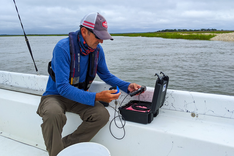 Todd Recicar, our marine operations supervisor, testing out the new hydrophone equipment.