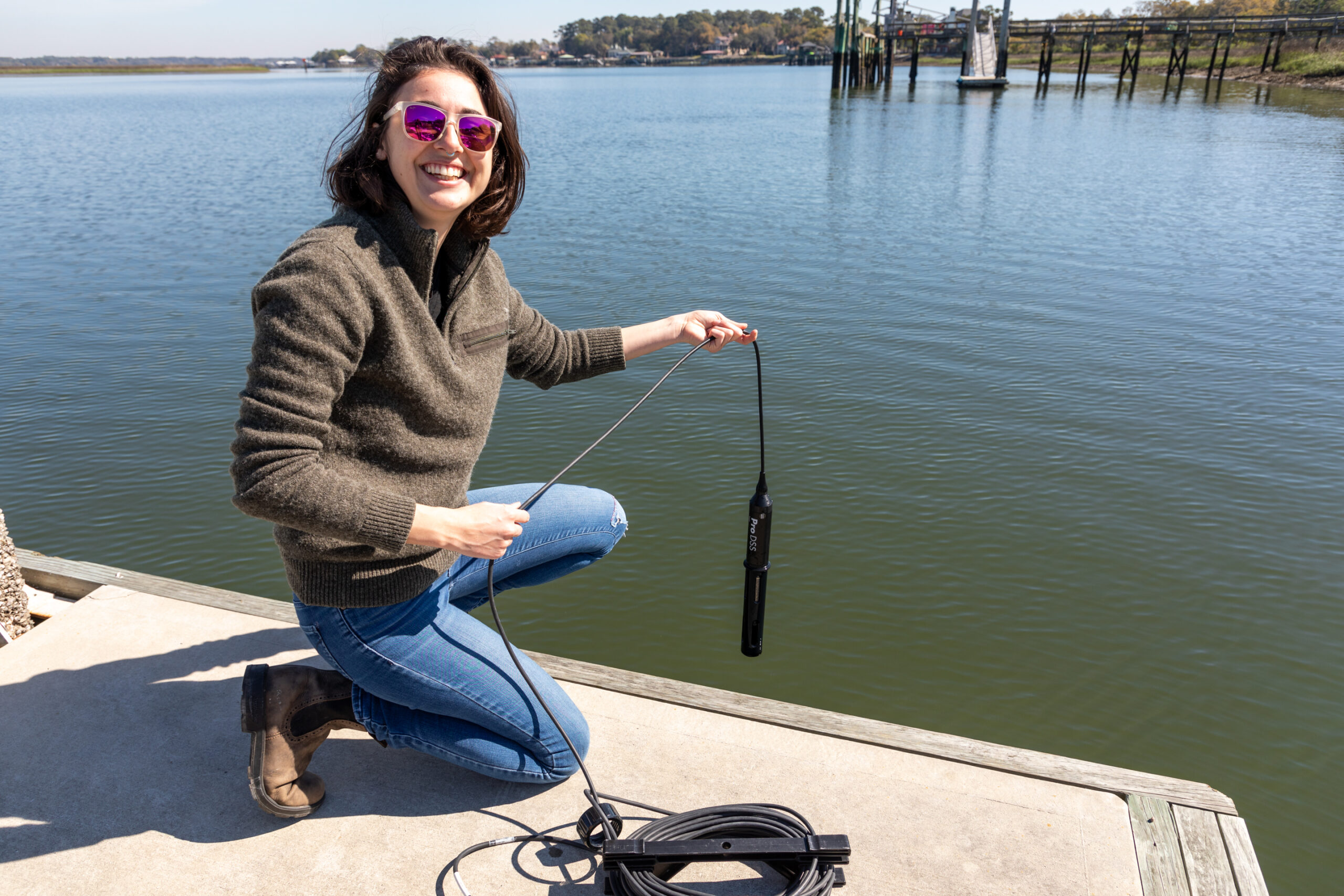 Research Trainee Mallory Mintz collects water quality data from the Skidaway River as part of her 2023-2024 research project looking at harmful algal blooms.