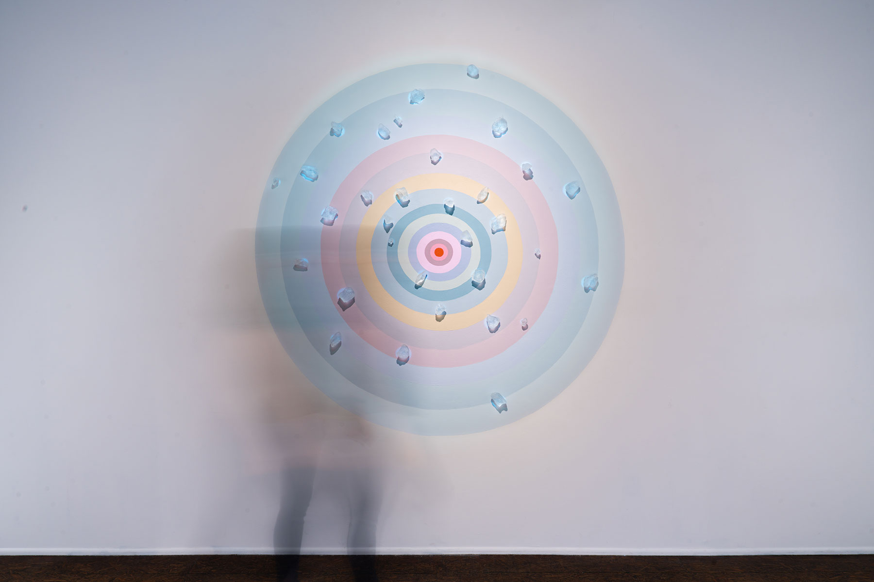a circular artwork in a raindbow of colors